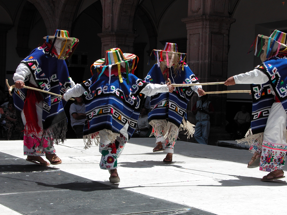 Dance of the old men
Four old men dancers wearing colorful 