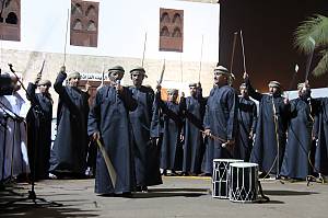 Al ‘azi, elegy, processional march and poetry