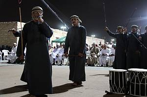 Al ‘azi, elegy, processional march and poetry