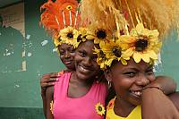 The carnival groups ("comparsas") in the districts' parades have a new theme each year, enriched with colourful costumes (cachés) Read more on the element