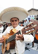 Mariachi, string music, song and trumpet