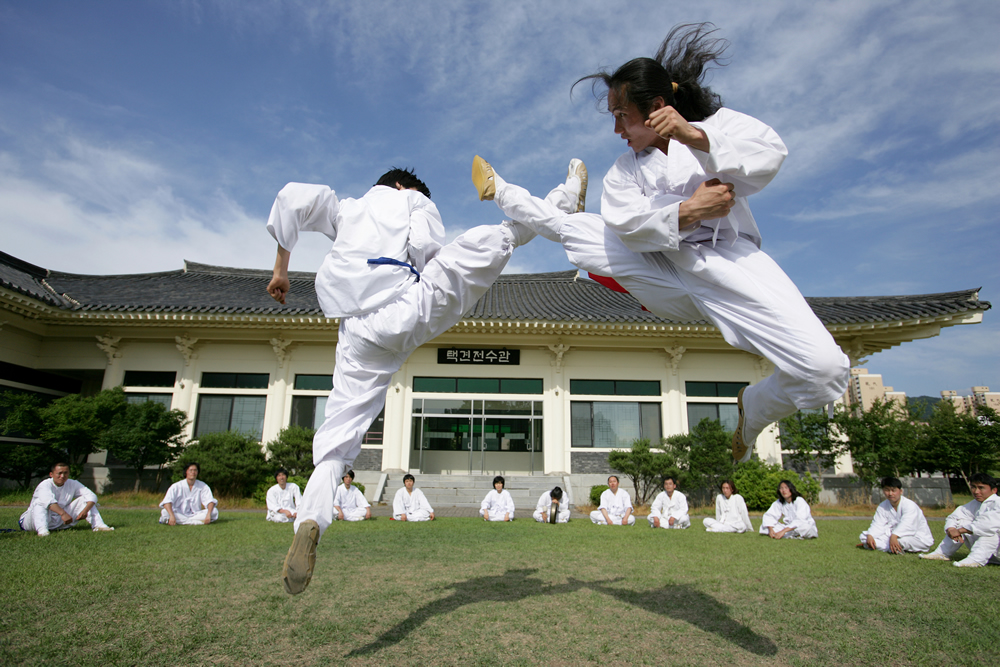 Two practitioners of Taekkyeon, a traditional Korean martial art