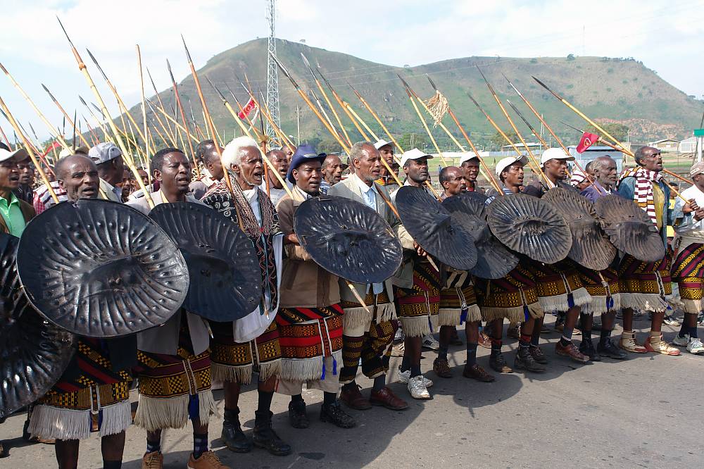 Ketala is a traditional singing and dancing performed by adult male community members, wearing a traditional cloth, known as gonfa, with red, white and black strip colors and buluko (home-spun cotton cloth) and holding spear and shield.