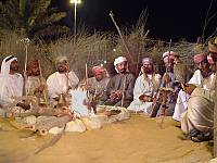 Al Hadeera Majlis: Bedouins sitting in a circle in the open air. A fire is lit in the center of the Majlis for light, heat and preparing coffee. The fire is also used as a guide for travellers and those lost in the desert.