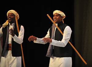 Almezmar, drumming and dancing with sticks