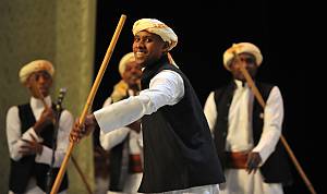 Almezmar, drumming and dancing with sticks