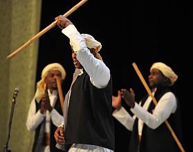 Almezmar, drumming and dancing with sticks