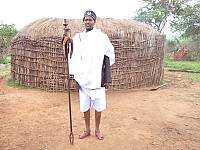 Guyo Goba, the seventieth Abaa Gada of the Borana Oromo, ties ‘kallacha’  headgear on his forehead which is a symbol of power, and bearing a staff known as Hororo and a whiplash (Litcho) in his hand and wearing shorts (Hida)