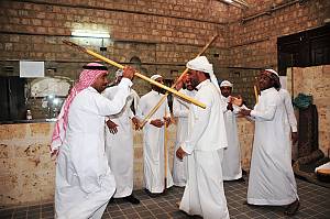 Almezmar, drumming and dancing with sticks