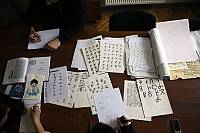 Students of the Graphic Design Faculty of the State Academy of Fine Arts in calligraphy of three systems of Georgian alphabet