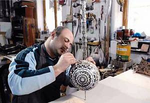 Art of crafting and playing with Kamantcheh/Kamancha, a bowed string musical instrument