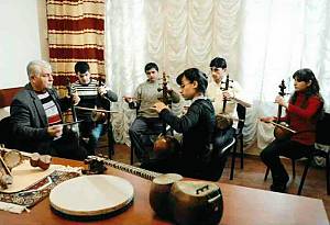 Art of crafting and playing with Kamantcheh/Kamancha, a bowed string musical instrument
