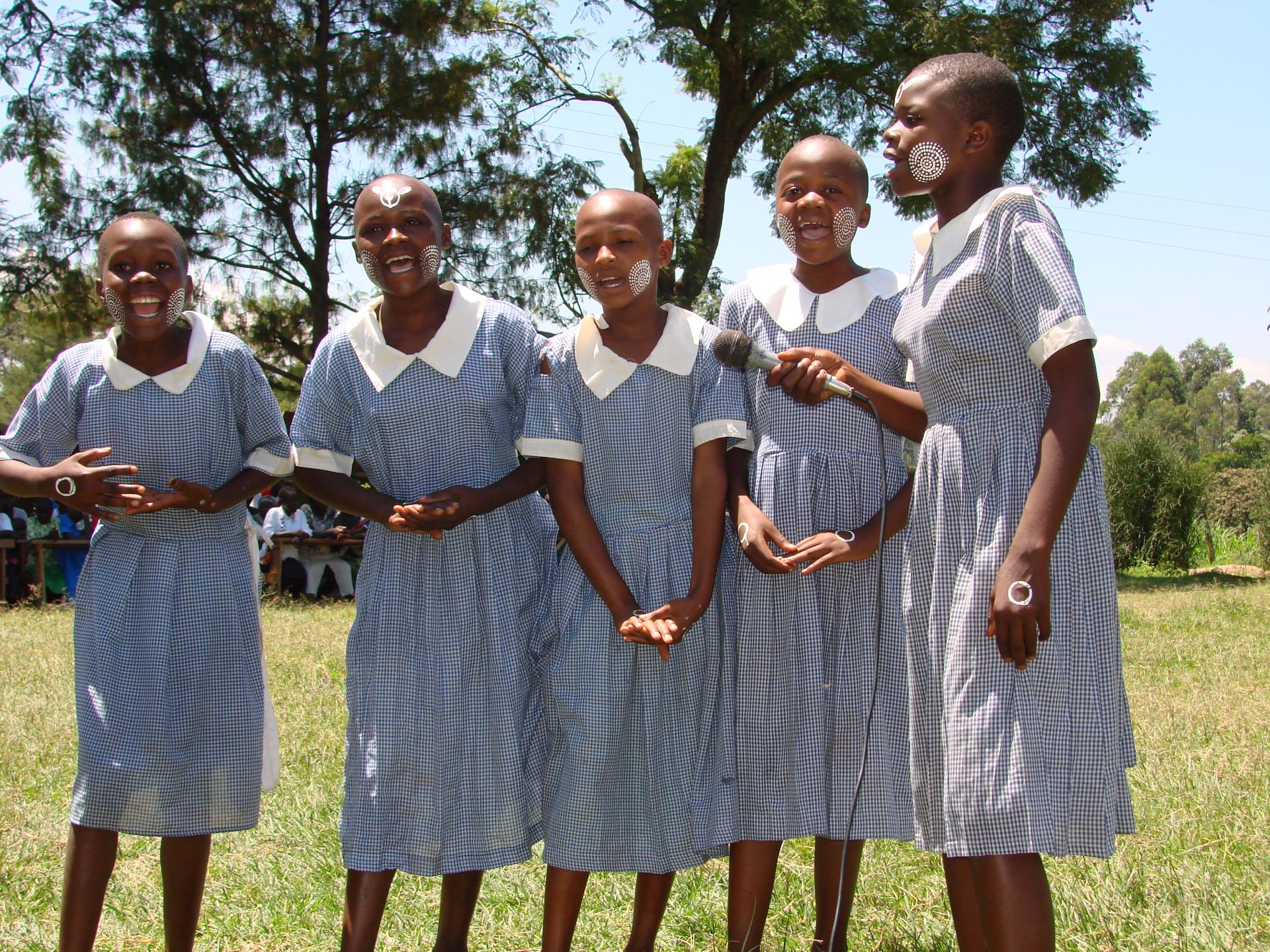 Girls from Muraka Primary School, Kakamega County, reciting a poem on traditional foods during a foodways fair.