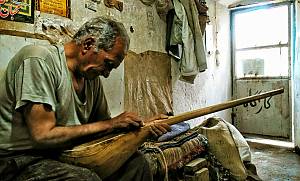 Traditional skills of crafting and playing Dotār
