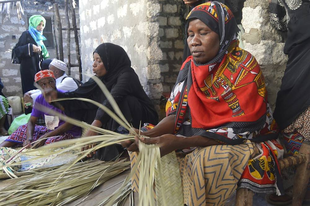 Maendeleo Nuru Ali Jumaa Women’s Group from Matondoni in Lamu engaged in the art of weaving – Kushuka shupatu - an aspect of Lamu’s intangible cultural heritage being inventoried as part of a UNESCO project in Kenya.