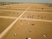 Support camel racing practitioners by allocating the necessary space for camel breeding