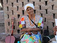 Ms Goiemann, a guitalist that performs the Aboxan Musik ǀŌb ǂÂns tsî ǁKhasigu Read more on the element