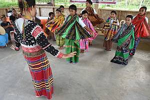 Young Blaan learners being taught by a cultural master of a traditional Blaan dance called Maral Tahu Read more on the element