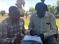 Chief Chitembo, Chitembo Chiefdom, Chifunabuli District, Luapula Province, signing consent form