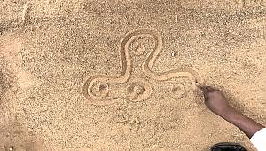 Sona, drawings and geometric figures on sand