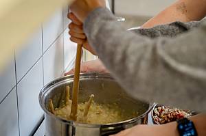Cooking and eating Mulgi puder, traditional mashed potato with barley in the Mulgimaa region, Estonia