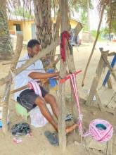 Craftsmanship of traditional woven textile Kente