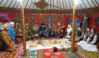 Every familiy sets the Nauryz table which is filled with all kinds of drinks and dishes