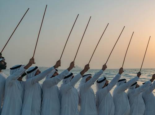 Raising bamboo sticks is one of the expressive ways to perform Al Ahalla.