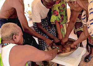The bearing of the sacred stone or the rites of the New Year in the Guin country in Togo